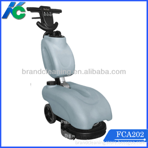 Mini walk behind floor scrubber with battery power